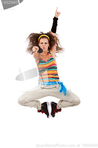 Image of woman dancer jumping and poiting 