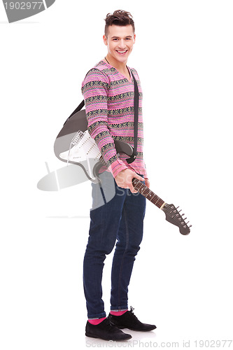 Image of Rock star with an electric guitar smiling