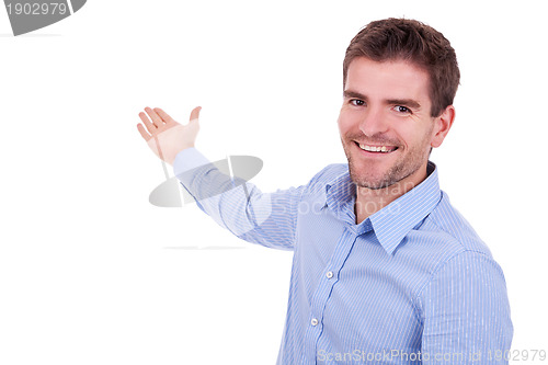 Image of man in casual clothes presenting