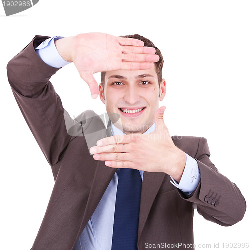 Image of executive making frame with his hands