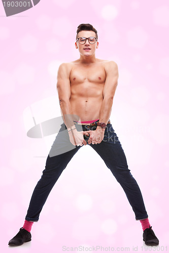 Image of full body picture of a confident shirtless man