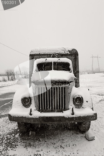 Image of abandoned old truck in winter