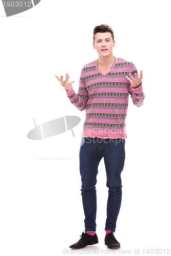 Image of Young man talking and explaining