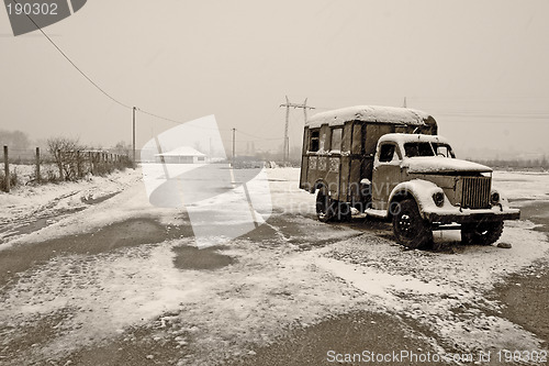 Image of abandoned old truck in winter