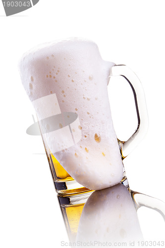 Image of Mug of beer with foam 