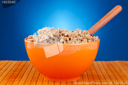 Image of bowl of cereal and spoon 