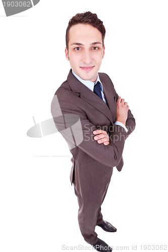 Image of confident businessman with his hands crossed