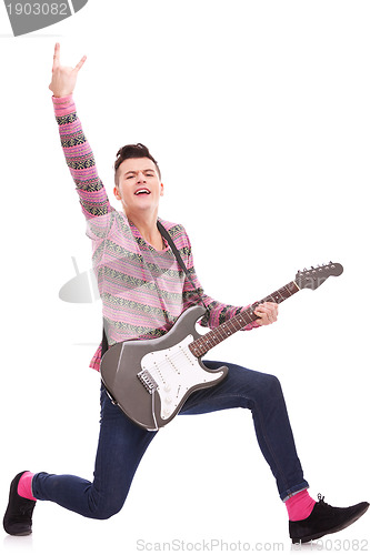 Image of excited rock star with an electric guitar