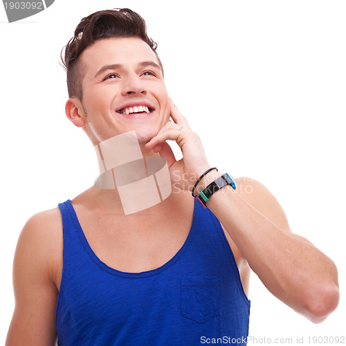 Image of pensive young casual man looking away 