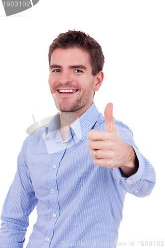 Image of handsome young man with ok gesture