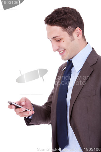 Image of happy business man reading an SMS