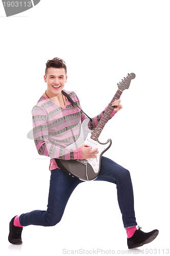 Image of Guitarist Playing six-string electric guitar