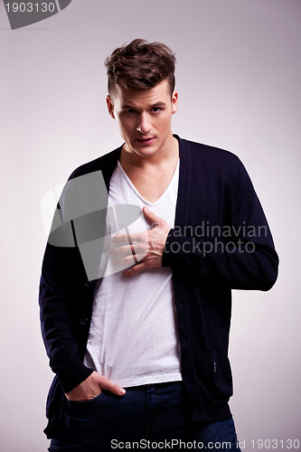 Image of serious casual man posing