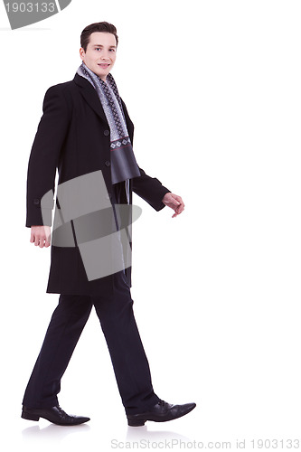 Image of walking business man