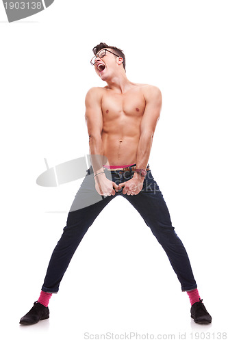 Image of screaming shirtless young man