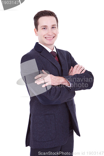 Image of attractive business man with arms folded 