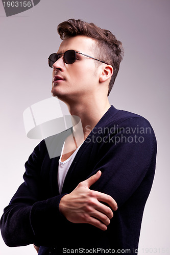 Image of side of a handsome young male model
