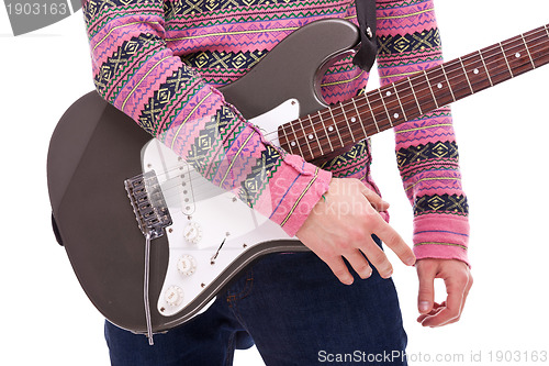 Image of closeup of a rock and roll guitarist