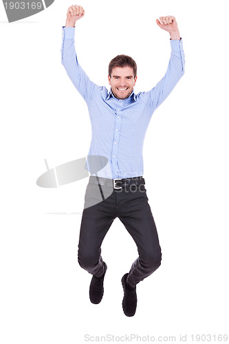 Image of Handsome man jumping 