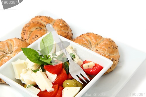 Image of vegetable salad (tomato, basil, olive)