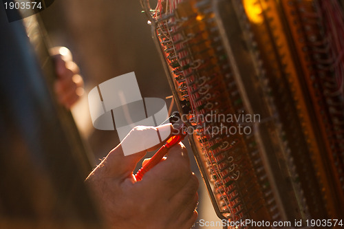 Image of Repairman clipping in