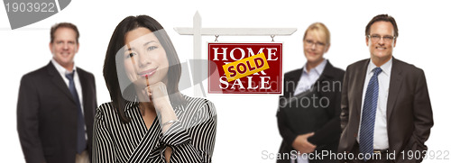 Image of Mixed Race People with Sold Real Estate Sign Isolated