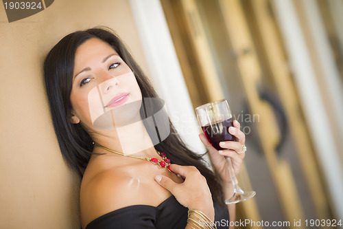 Image of Attractive Hispanic Woman Portrait Outside Enjoying Wine