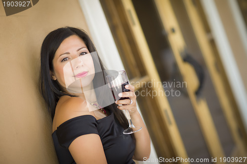 Image of Attractive Hispanic Woman Portrait Outside Enjoying Wine