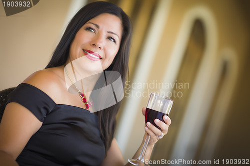 Image of Attractive Hispanic Woman Portrait Outside Enjoying Wine