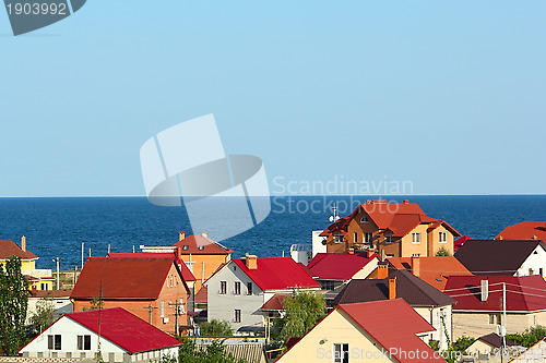 Image of Colored roofs at the seashore