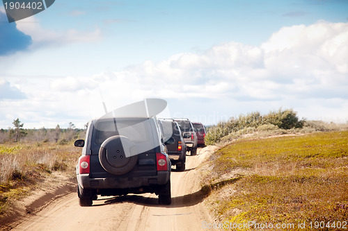 Image of big four-wheel cars in a row