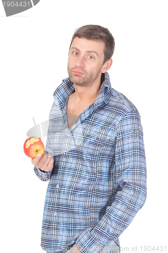 Image of Handsome casual man eat apple