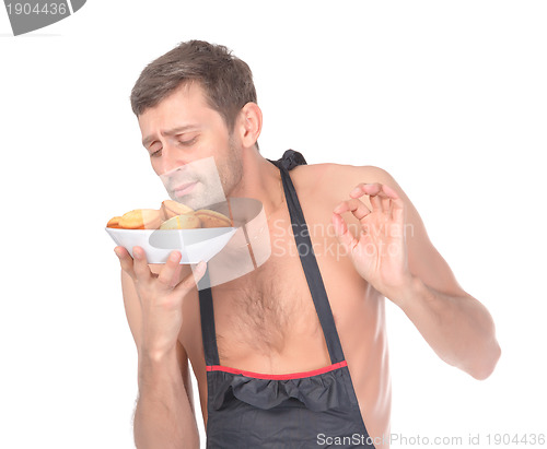 Image of Chef praising his own baking