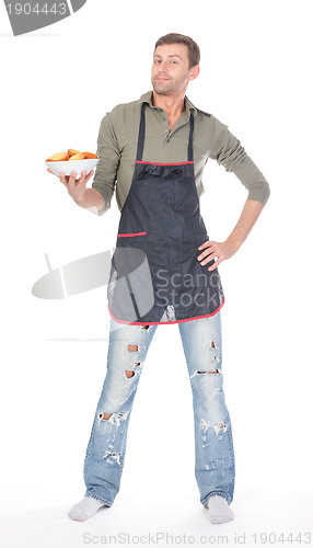 Image of Man trying his hand at baking