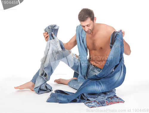 Image of Man deciding what to wear