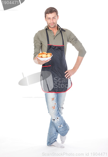 Image of Man trying his hand at baking