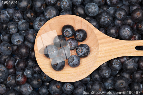 Image of Blueberries on a wooden spoon