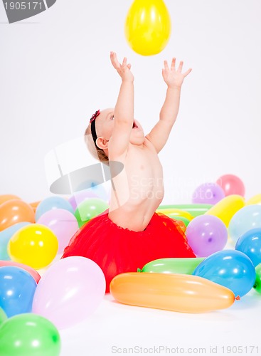 Image of cute little baby child with colorfull balloons birthday
