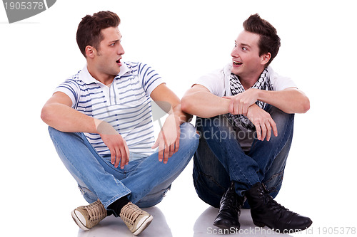 Image of two men friends looking one at the other