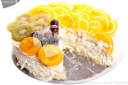 Image of fruity cake with a piece missing