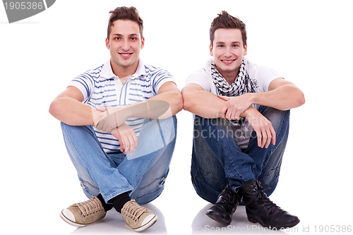 Image of two friends sitting next to each other