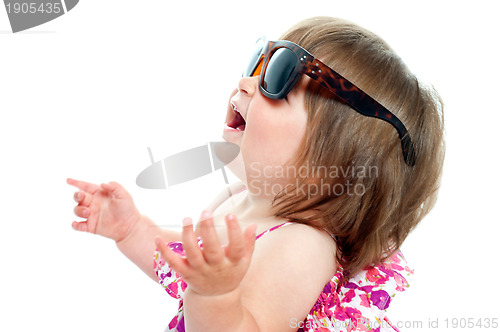 Image of Baby girl wearing over sized sunglasses