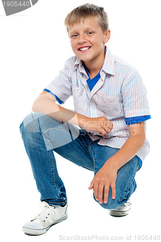 Image of Trendy young boy posing in casuals