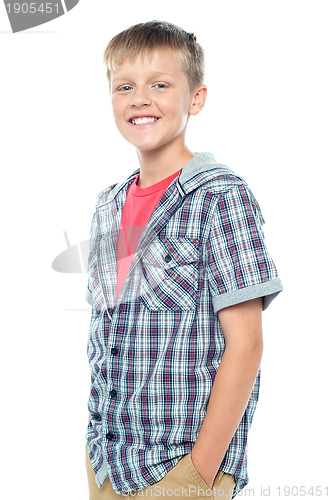 Image of Profile shot of smart young boy posing casually