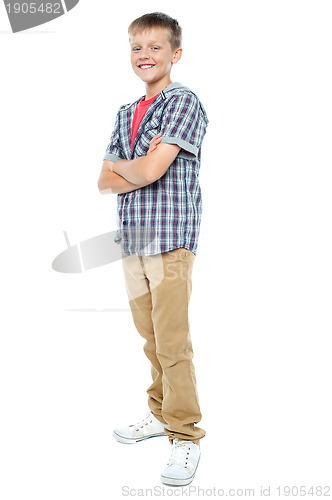 Image of Confident young casual 12 years old boy