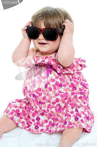 Image of Cute little toddler wearing classy shades