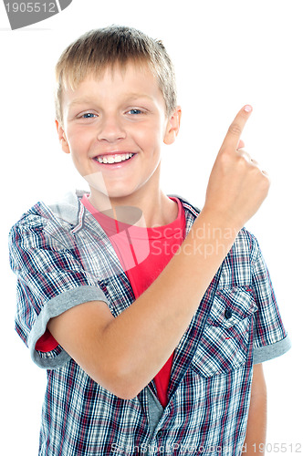 Image of Young boy posing on white background
