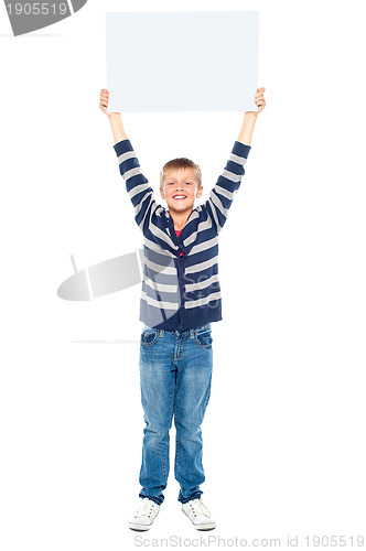 Image of Boy holding banner ad above his head