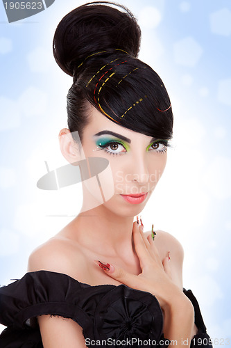 Image of model with great hairstyle, make-up and  manicure