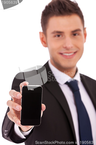 Image of buiness man shows a smartphone